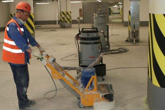 Промышленный пылесос COYNCO  для бетонной пыли в работе на строительстве паркинга